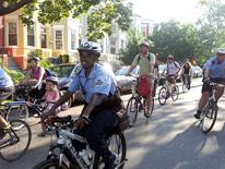 First District officers accompany families on their ride to school MPD and partner agencies work together in the community